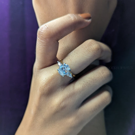 Oval Cut Diamond Ring with Trillion Side Stones