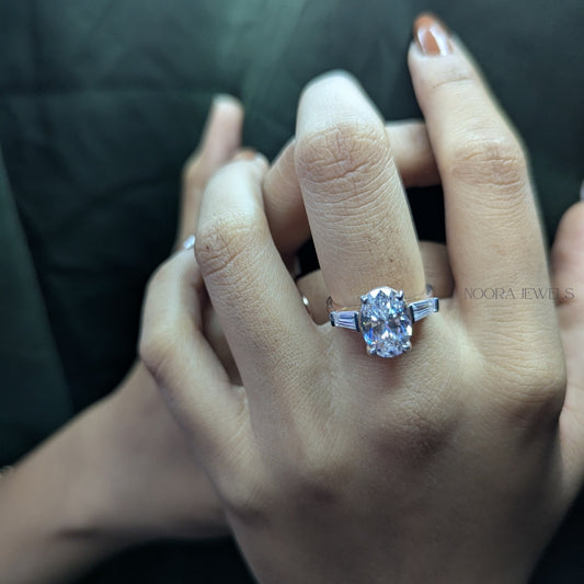 Elegant Oval Cut Diamond Ring with Baguette Accents